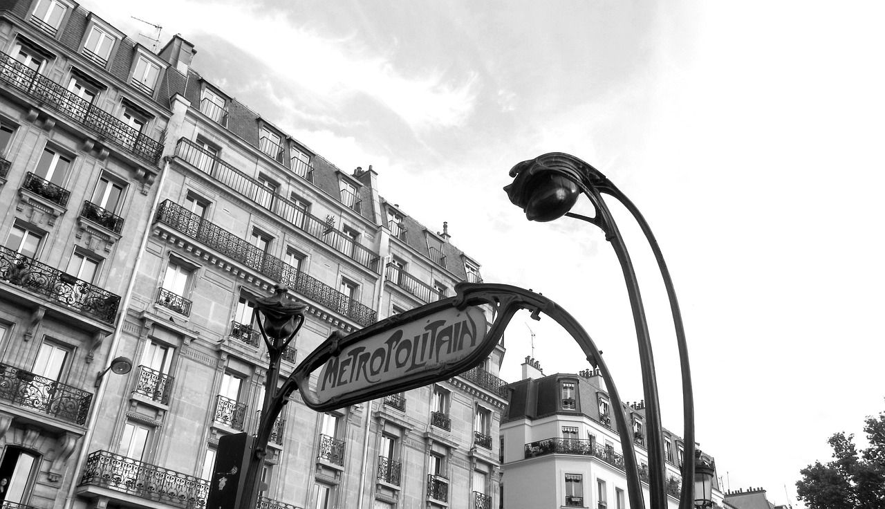 Art Nouveau Paris Metro entrance in Montmartre, evoking the Belle Époque era of Toulouse-Lautrec