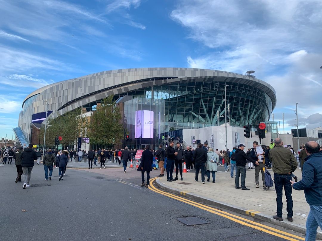 Tottenham Hotspur Stadium exterior illuminated at night