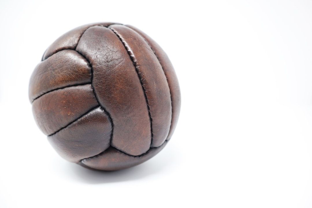 Vintage leather rugby balls evoking the early days of the sport
