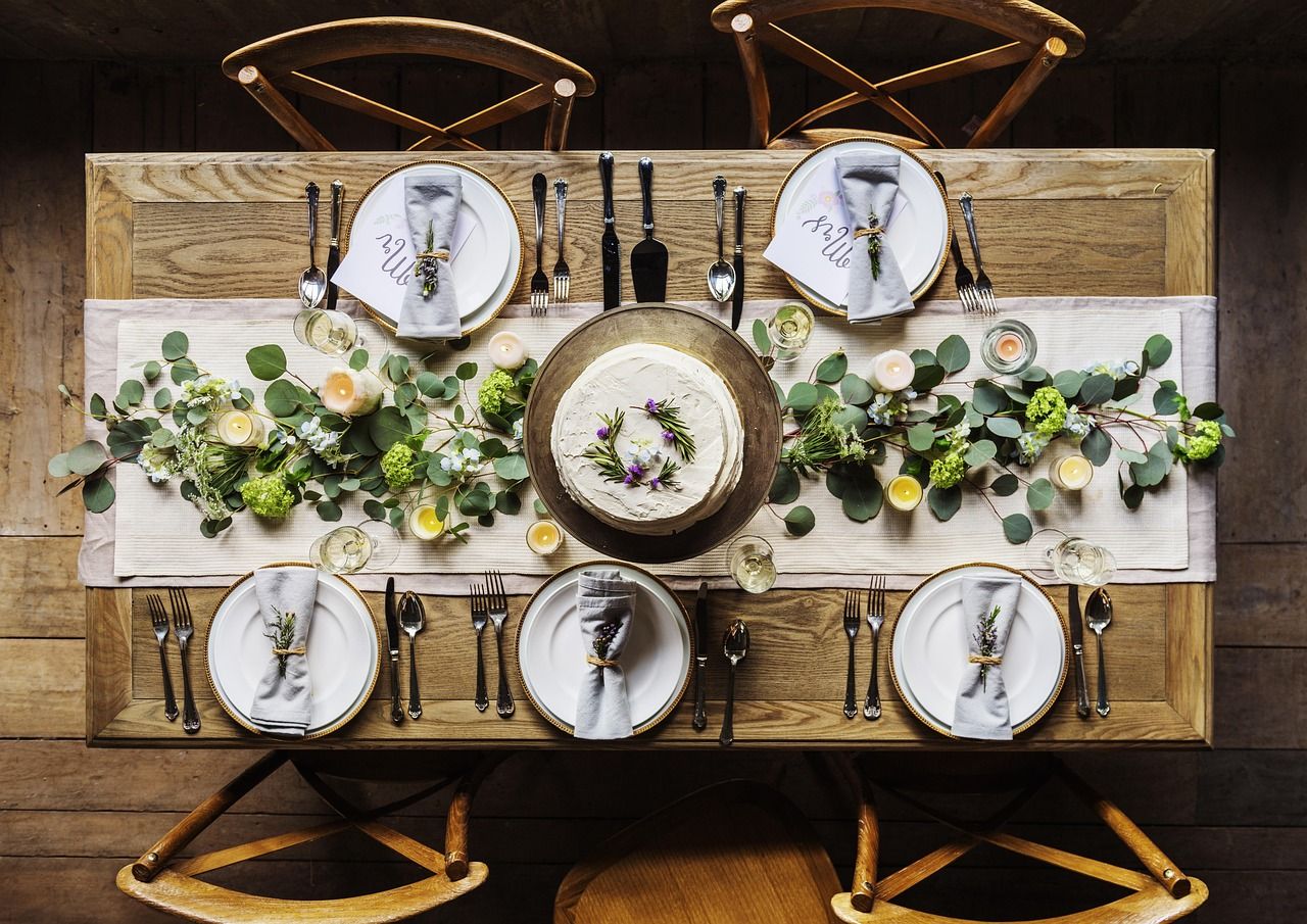 Elegant fine dining table setting with champagne glasses