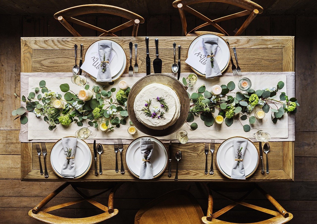 Elegant fine dining table setting with champagne glasses