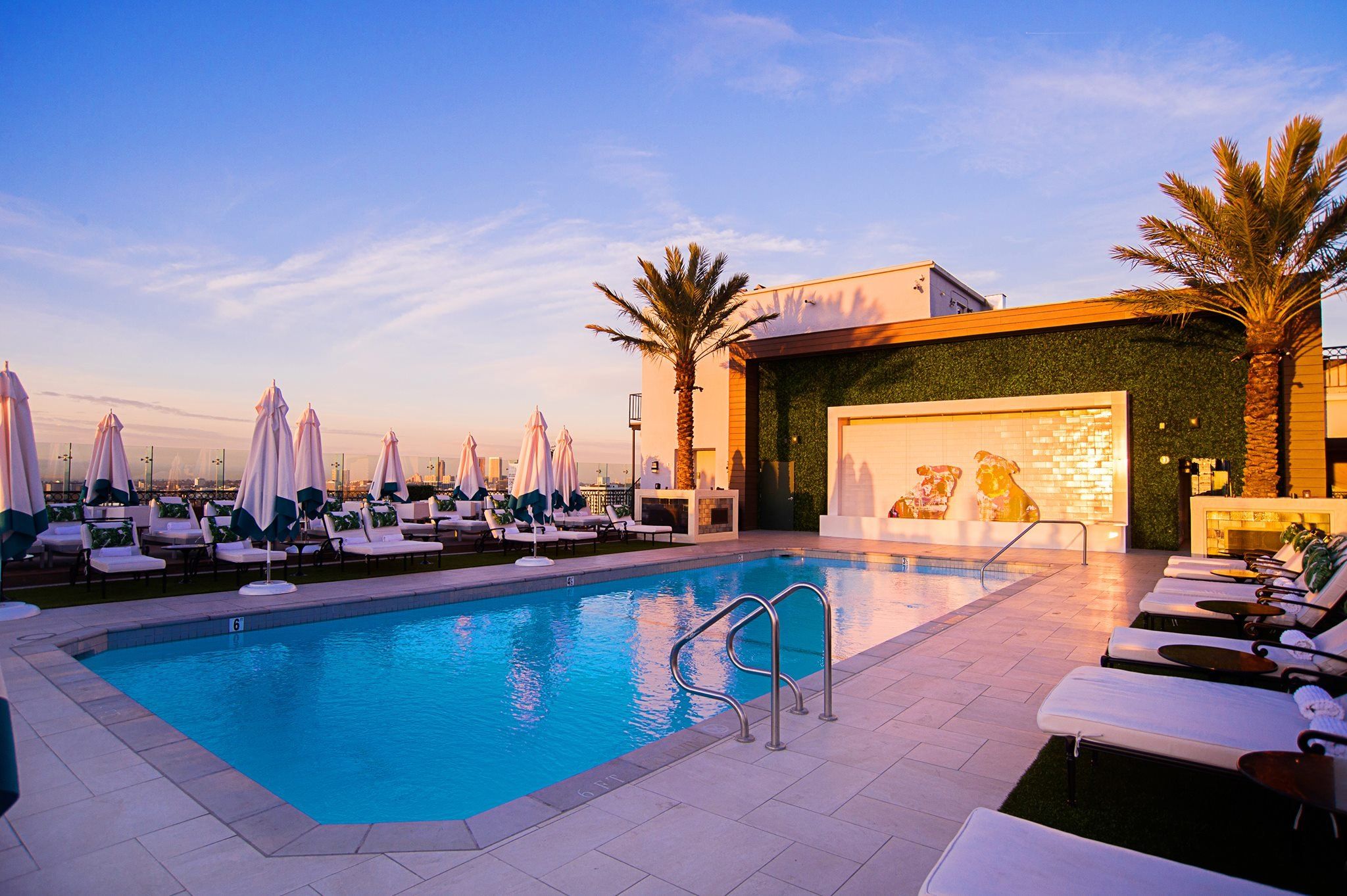 The rooftop pool at The London West Hollywood at sunset