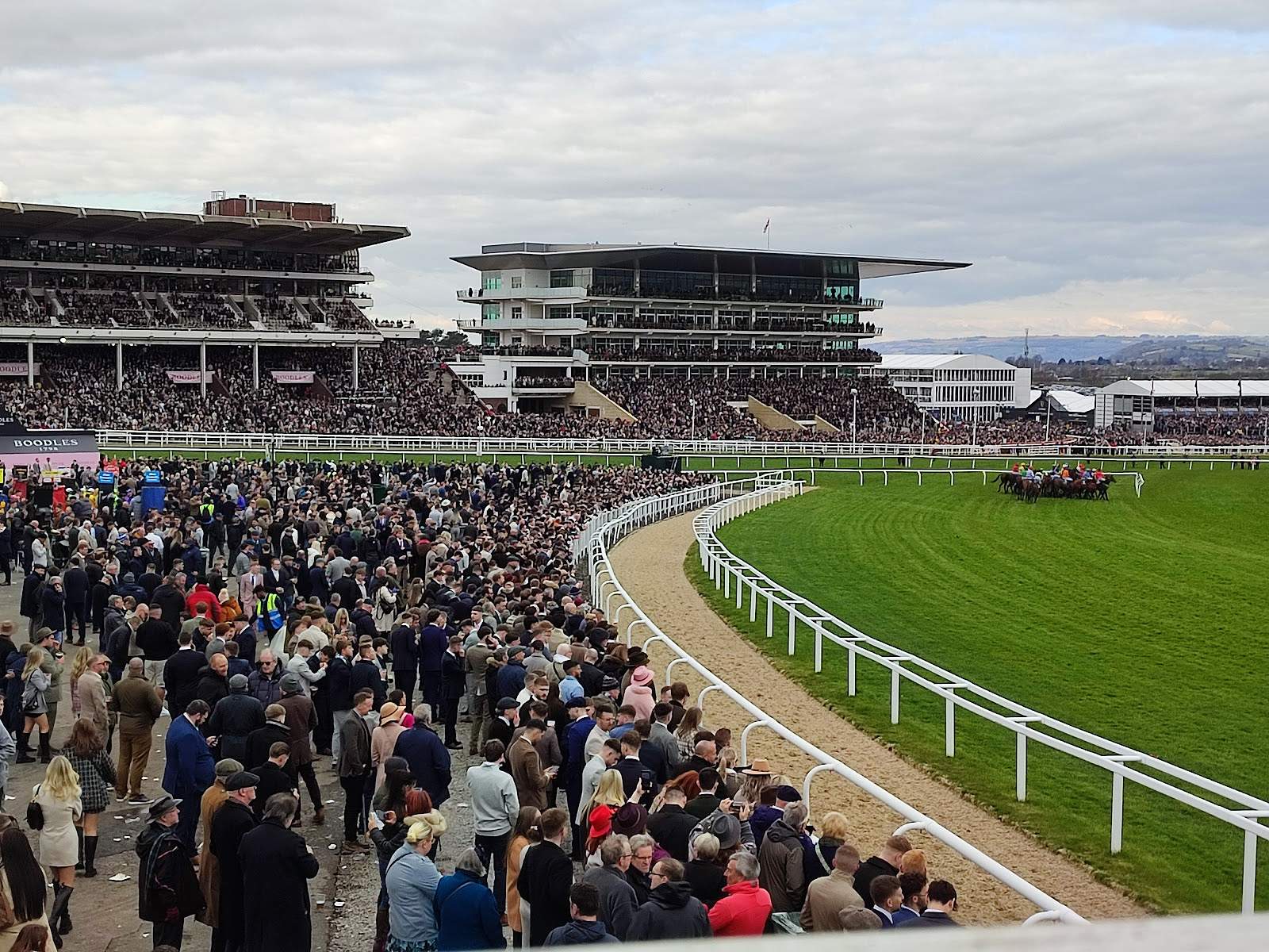 Cheltenham Festival crowd at the rails in the Tattersalls Enclosure