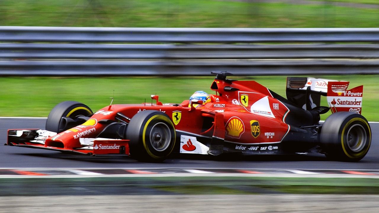 Ferrari Formula 1 car on the racing circuit, evoking the Schumacher era at Imola