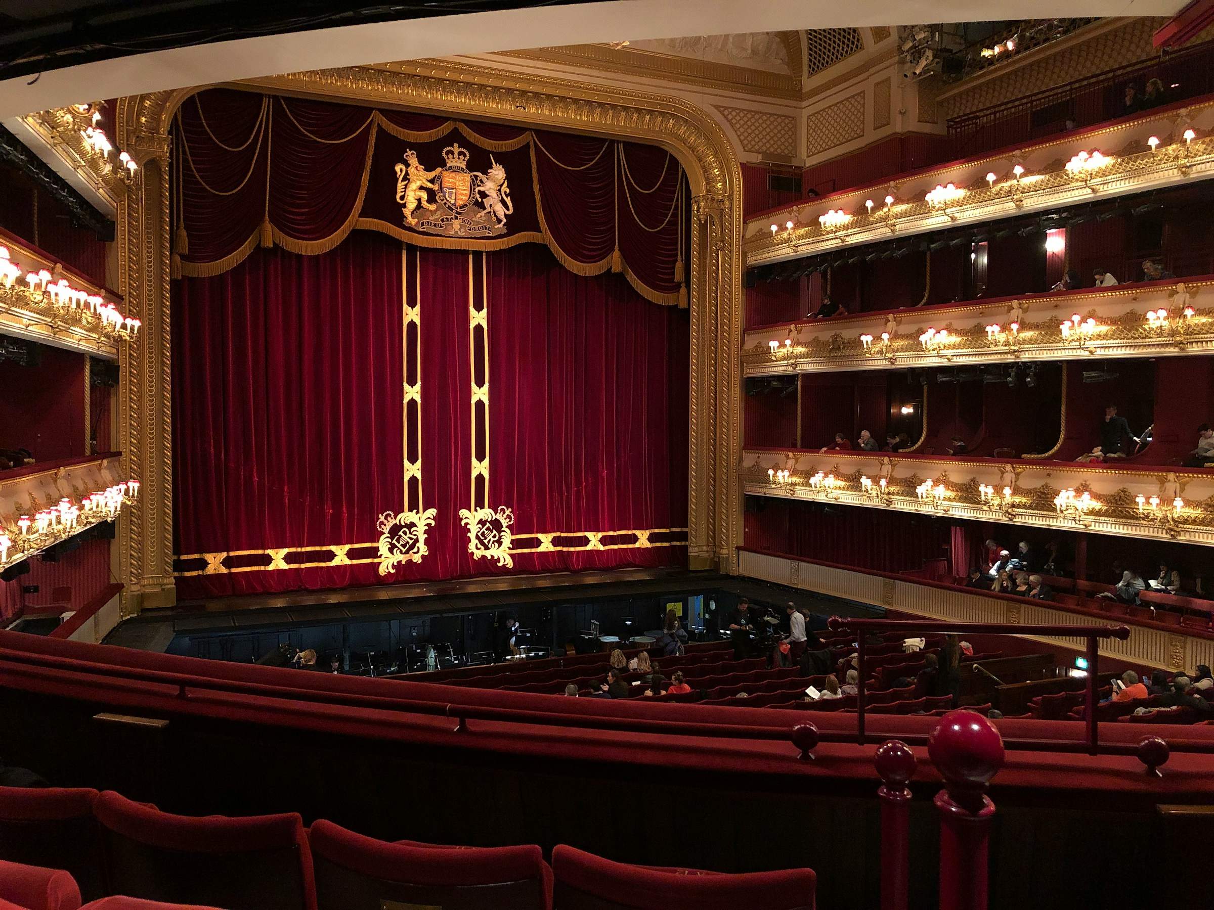Theatre stage with dramatic curtain and lighting