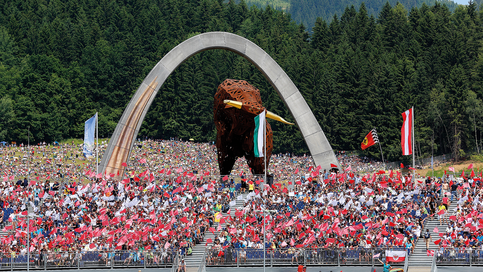 The Red Bull Ring grandstand crowd at the Austrian Grand Prix