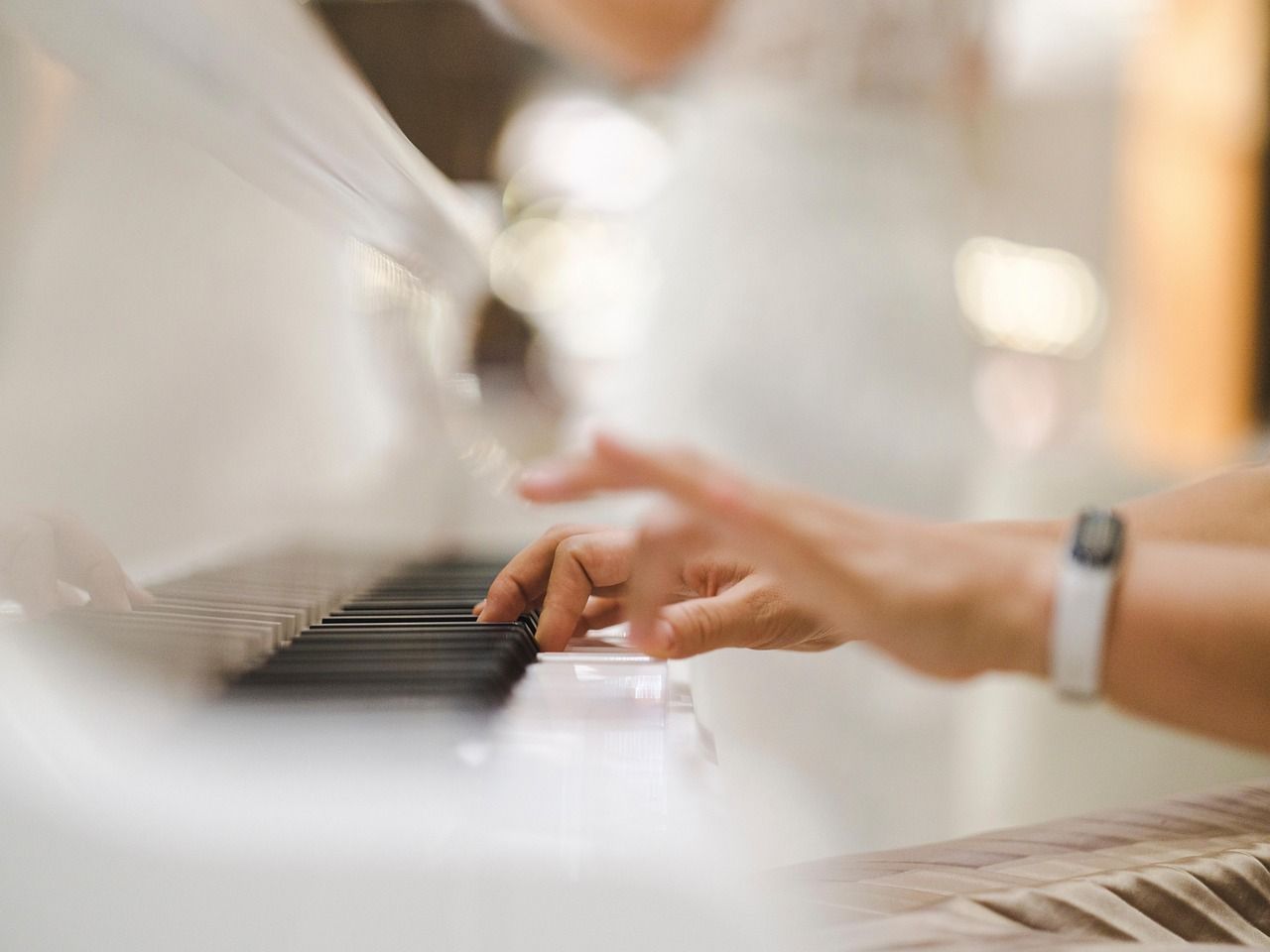 Pianist performing at a grand piano, reflecting Elton John's signature performance style