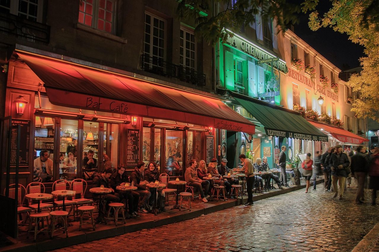 Paris Montmartre district at night, the neighbourhood where the Moulin Rouge was rebuilt after the 1915 fire