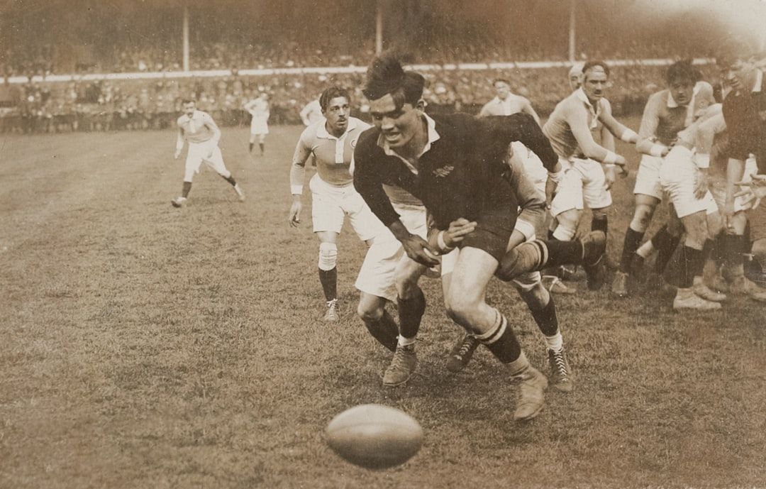 Vintage rugby match action from the early twentieth century