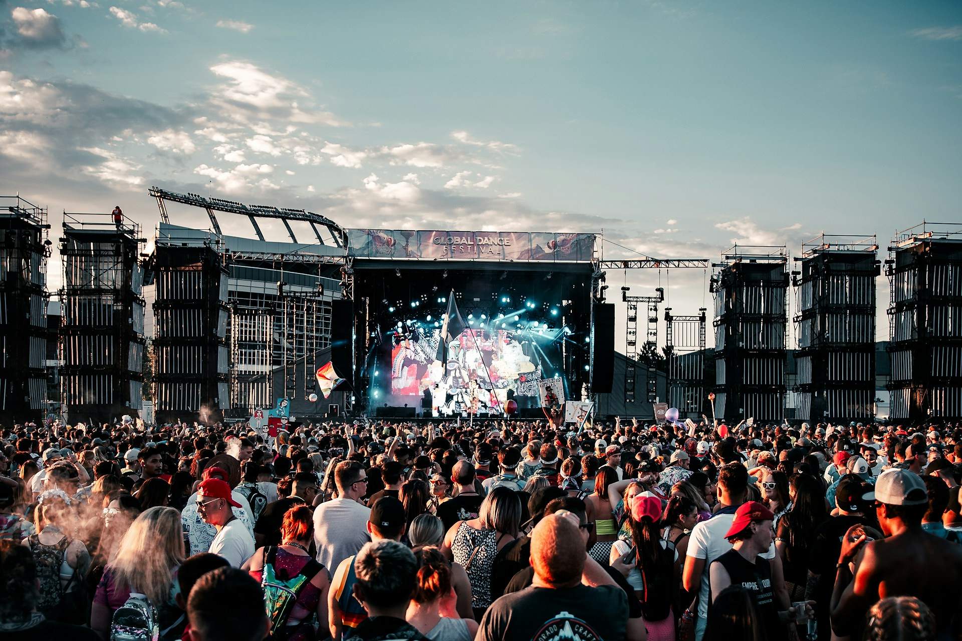 Live concert with dramatic stage lighting and crowd
