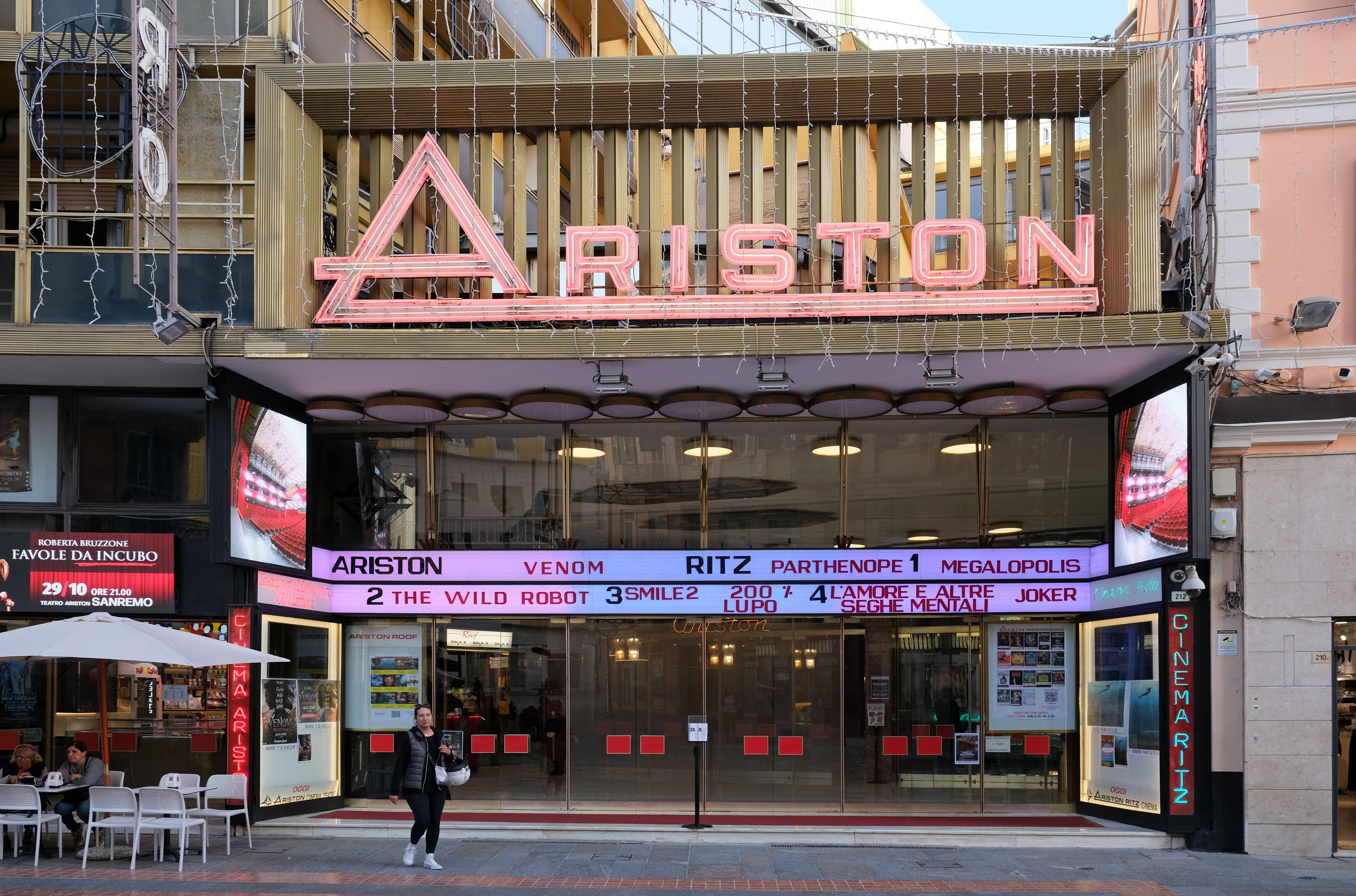 The neon-lettered facade of the Teatro Ariston in Sanremo