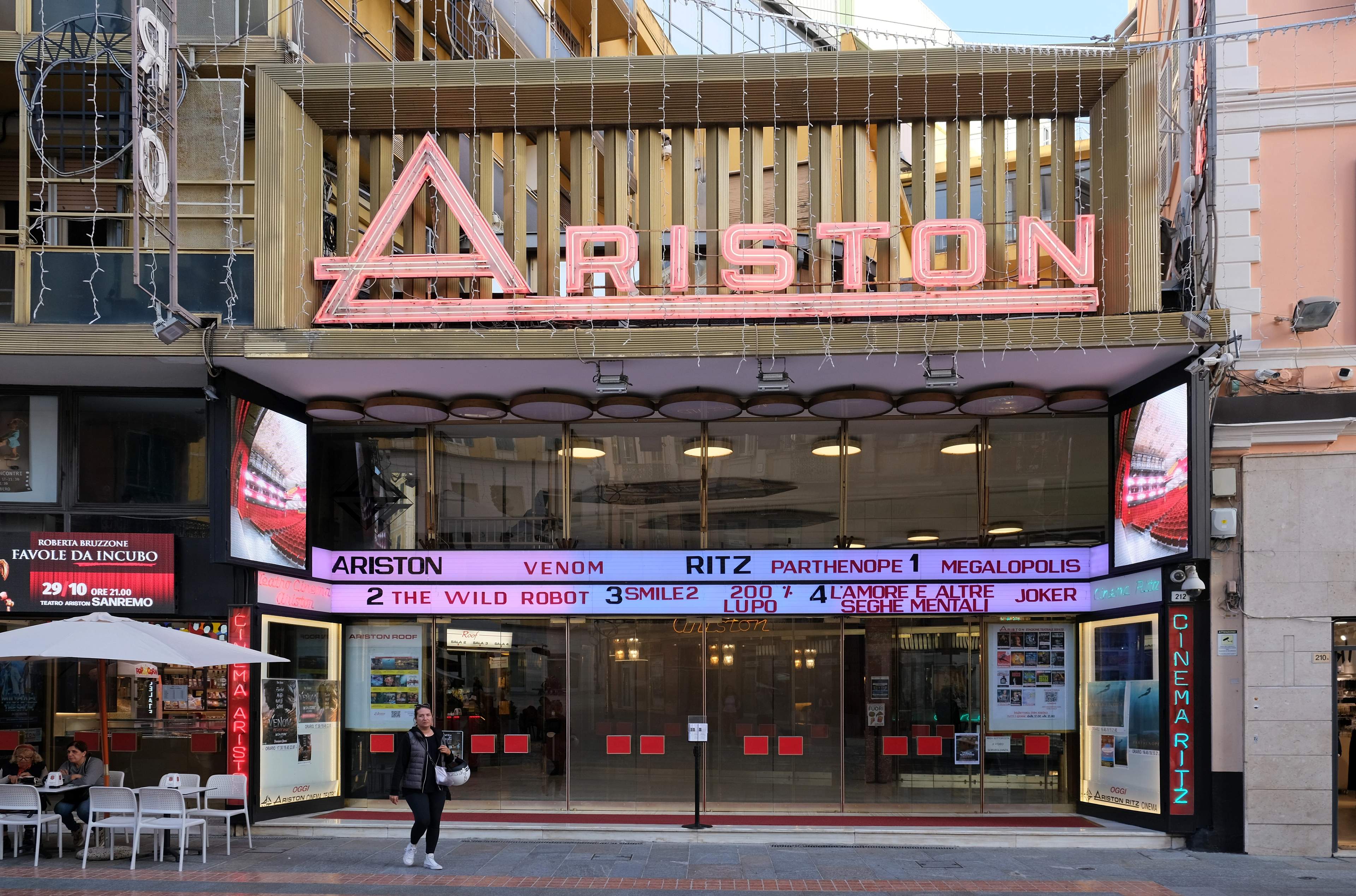 The neon-lettered facade of the Teatro Ariston in Sanremo