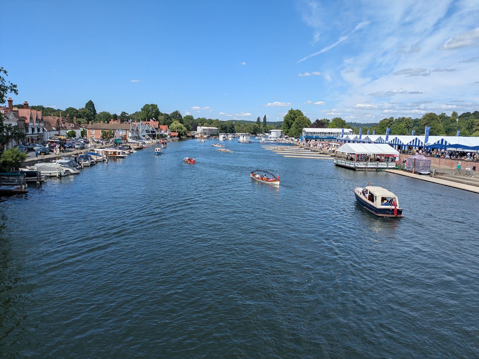 Spectators in blazers and dresses at Henley Royal Regatta