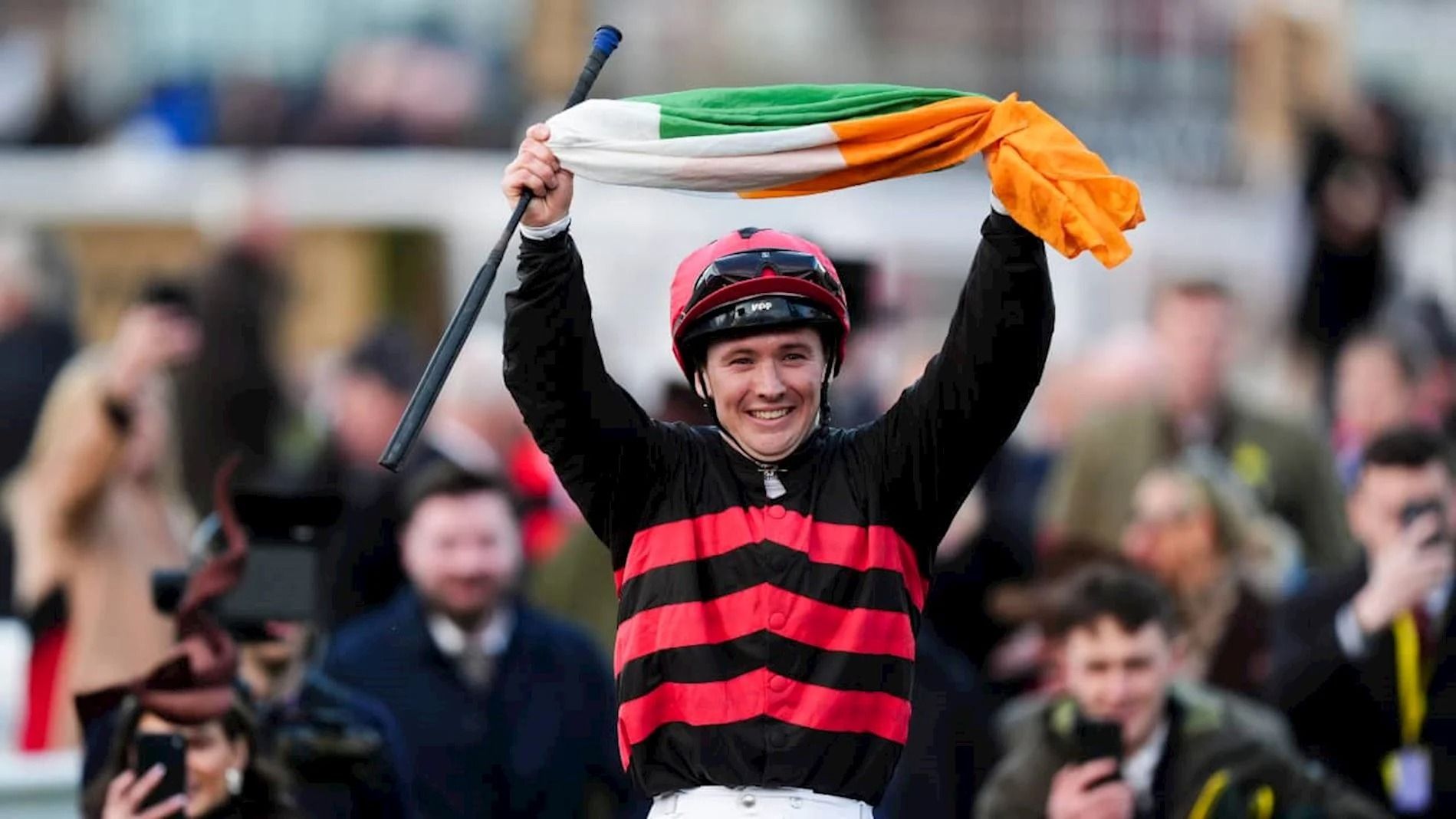 The Cheltenham Festival in full swing with crowds and racing action at Prestbury Park