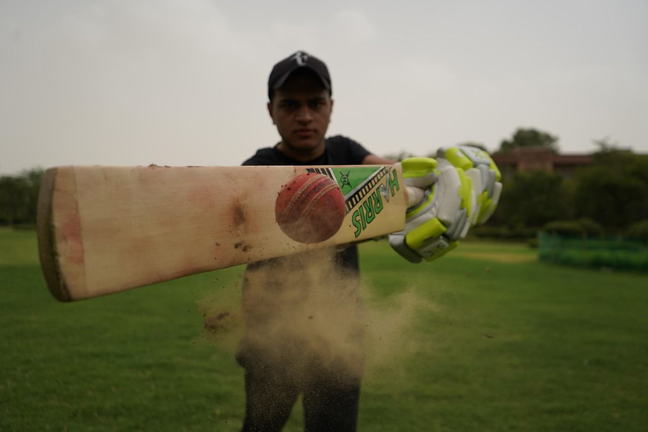 Cricket batsman playing an attacking shot