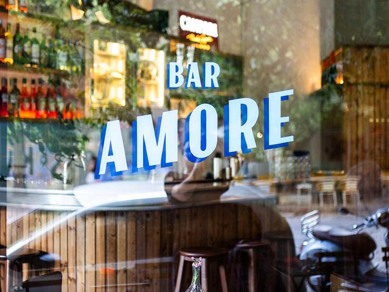 Interior of Bar Amore in Athens — a cocktail bar with warm, intimate atmosphere