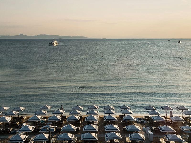 Astir Beach in Vouliagmeni, Athens Riviera — the historic beach club set among pine trees above the Saronic Gulf