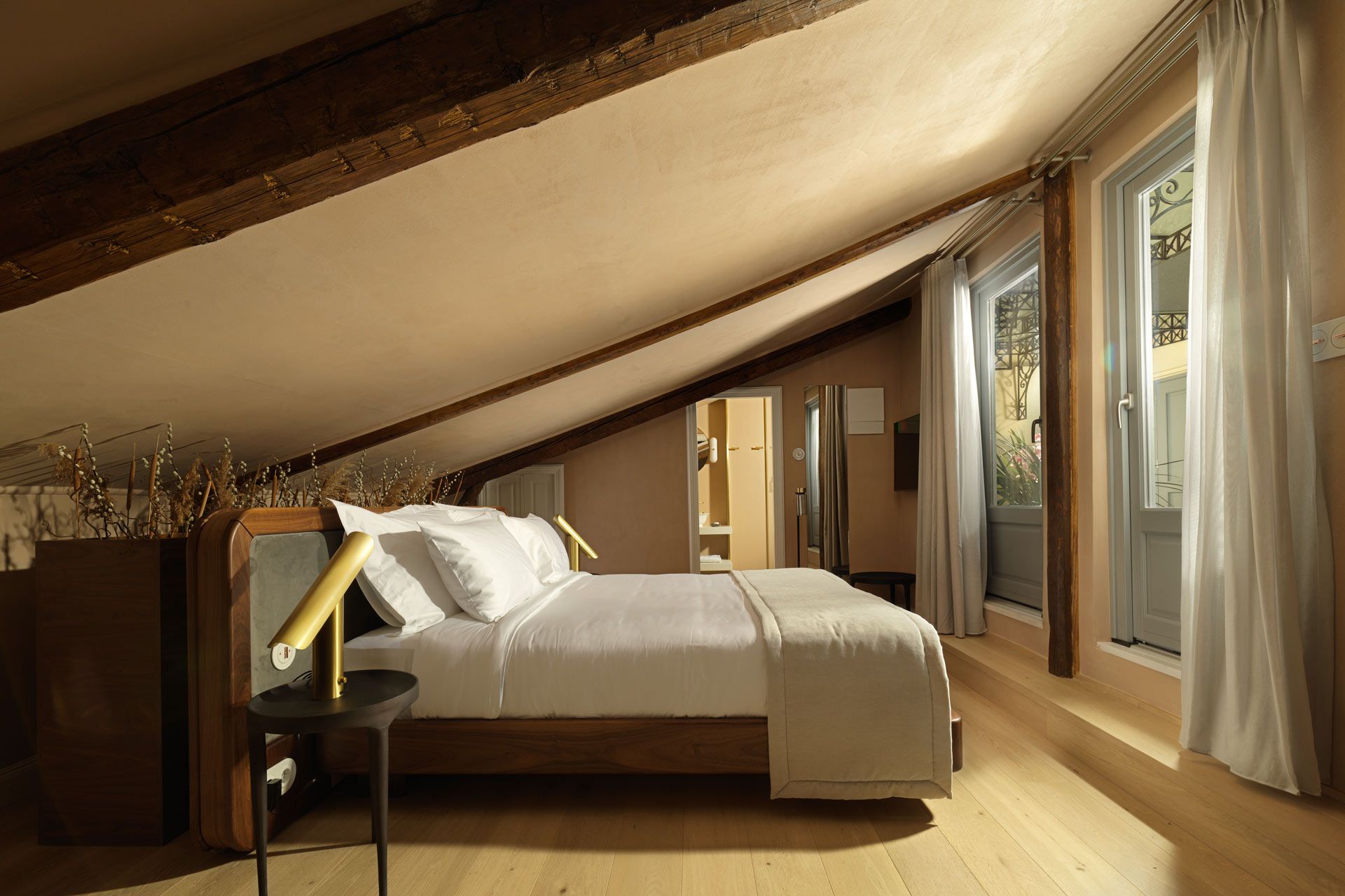 Monument Hotel Athens — individually designed guest room with intricate ceiling mural