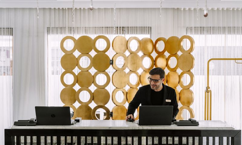 Pallas Athena hotel on Athinas Street in Athens — a Grecotel design hotel with commissioned street art murals throughout its rooms