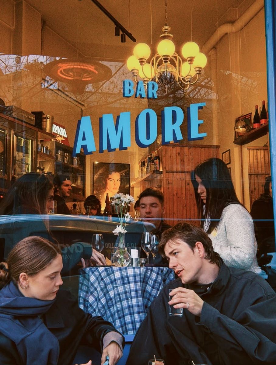 Bar Amore Athens — the bar counter lined with amaro and Italian spirits