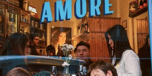 Bar Amore Athens — the bar counter lined with amaro and Italian spirits