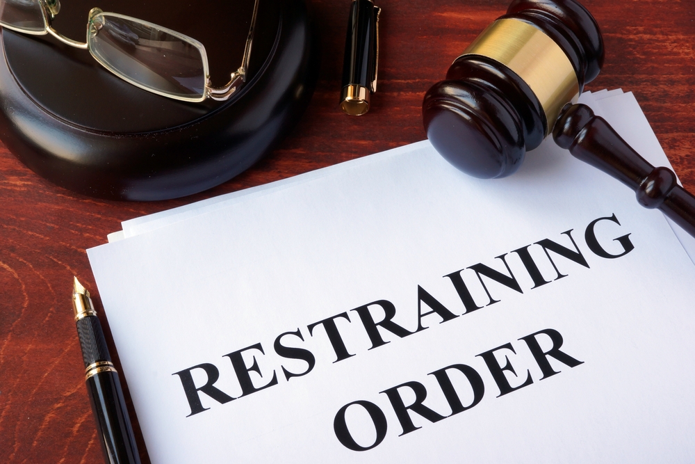 What can you do after receiving a temporary restraining order?