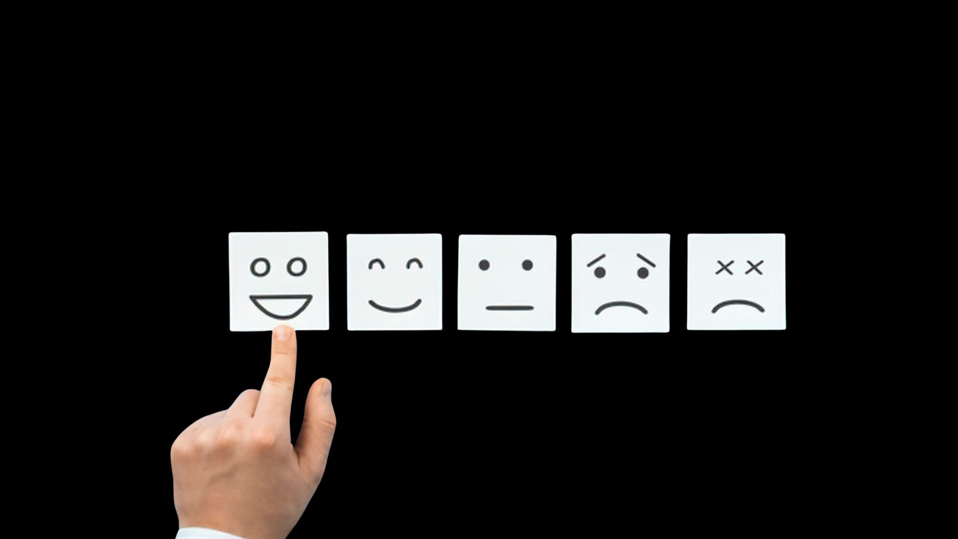 Smiley Bewertungen auf einem schwarzen Hintergrund. Hand zeig auf glücklichen Smiley.
