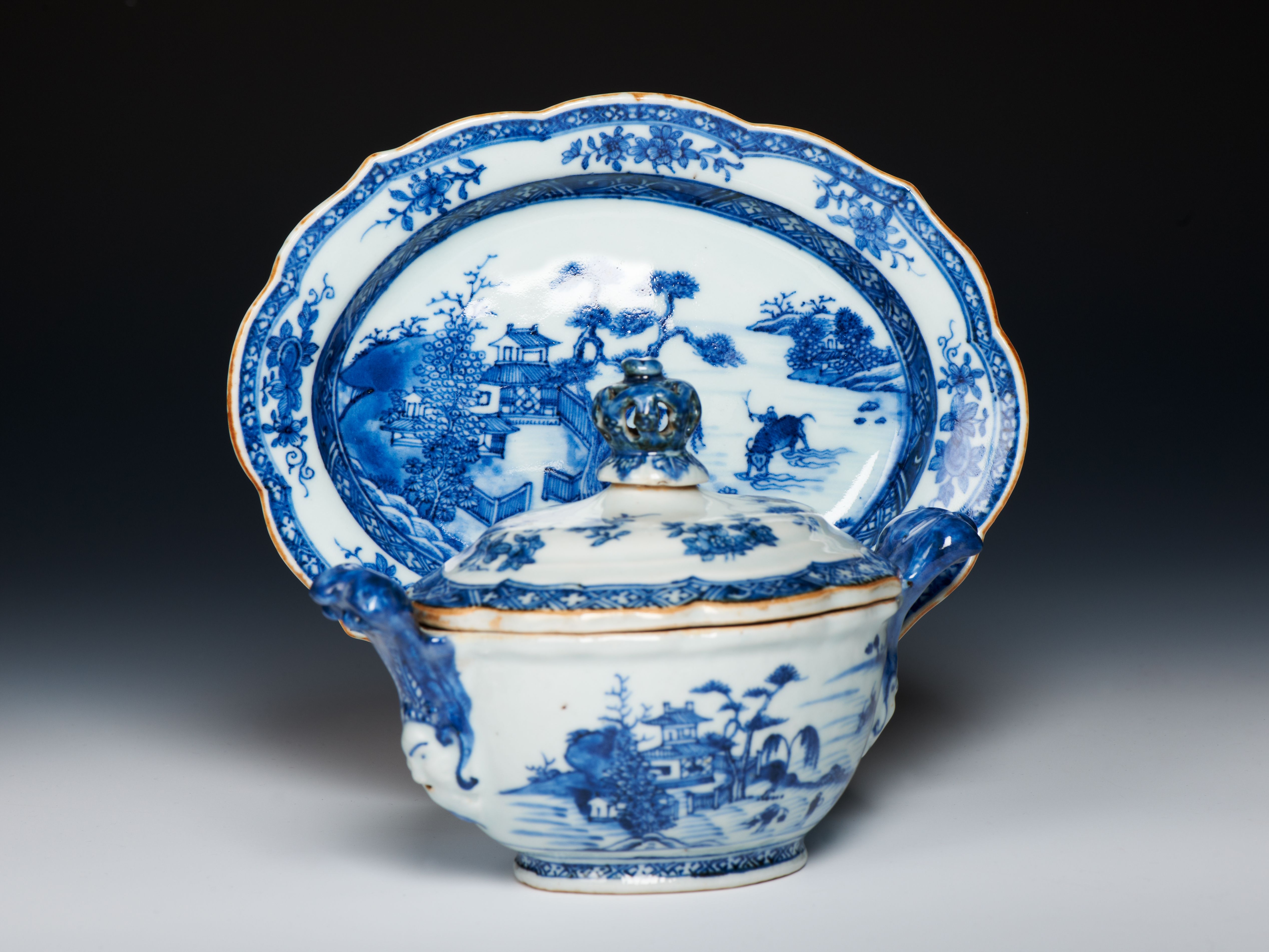 Chinese porcelain sauce tureen, crown finial and mask handles 