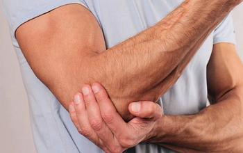 Man With Elbow Pain