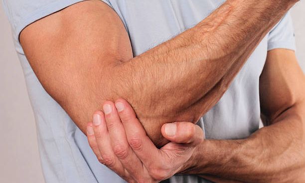 Man With Elbow Pain
