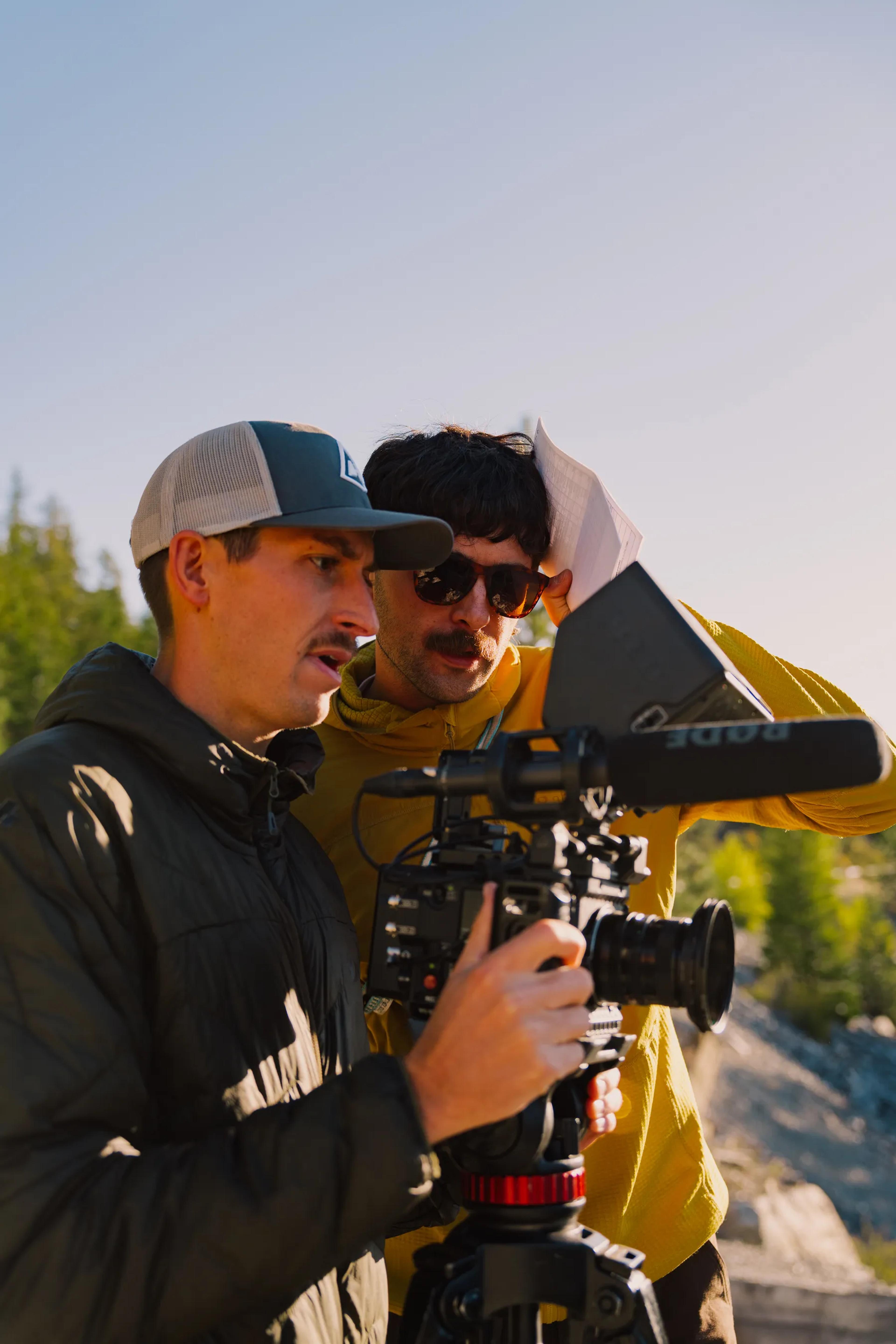 Justin and Colton looking at the shot