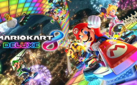 Mario Kart 8 Deluxe race in progress, four karts driving on a Rainbow Road circuit.