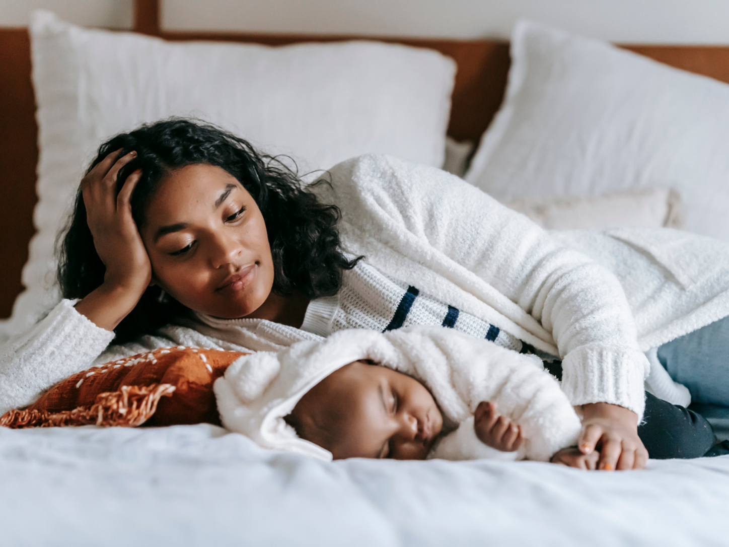 mom sleeping with baby