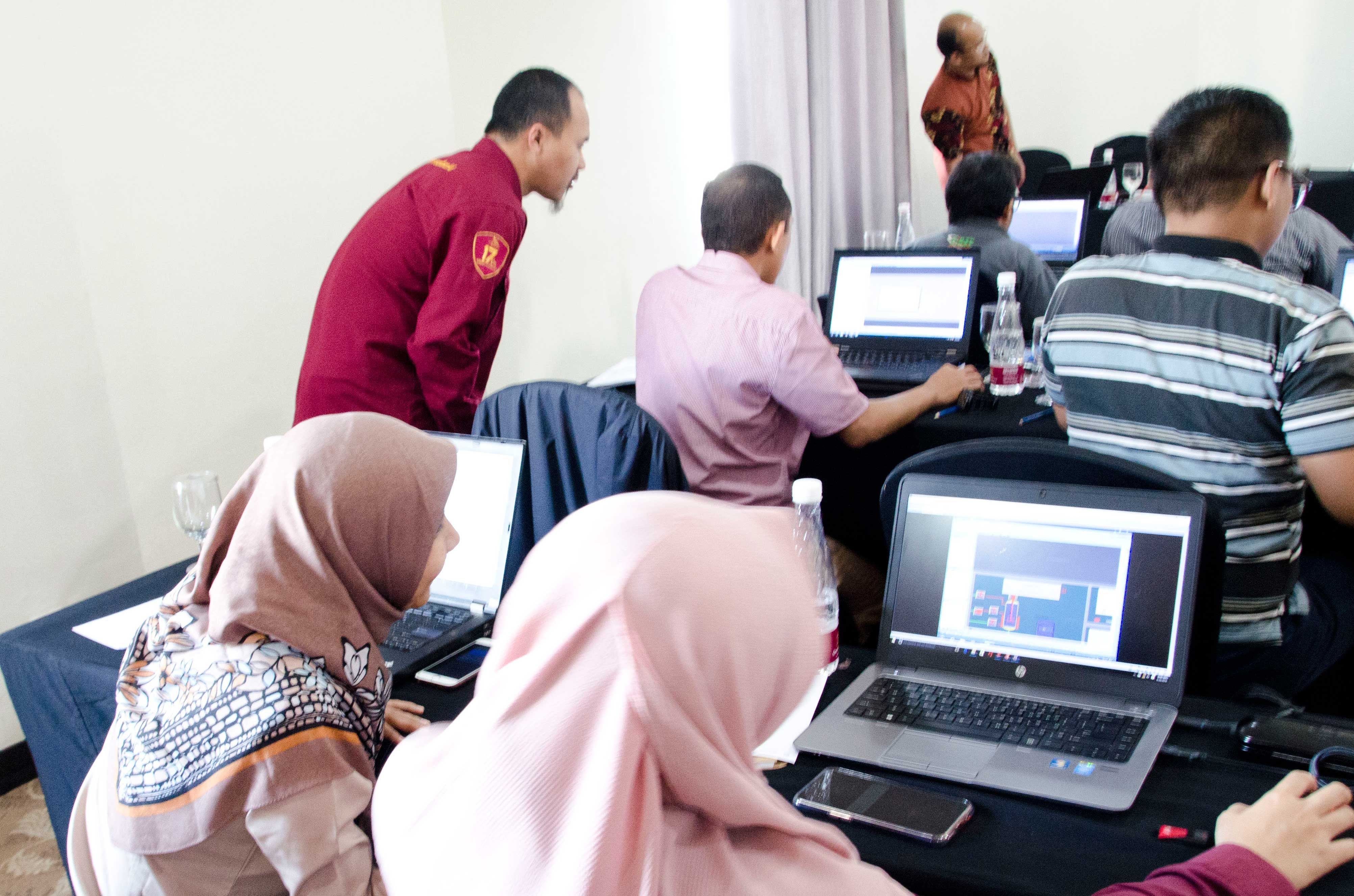 Participants are practicing detecting security gaps that have been breached using third-party applications.