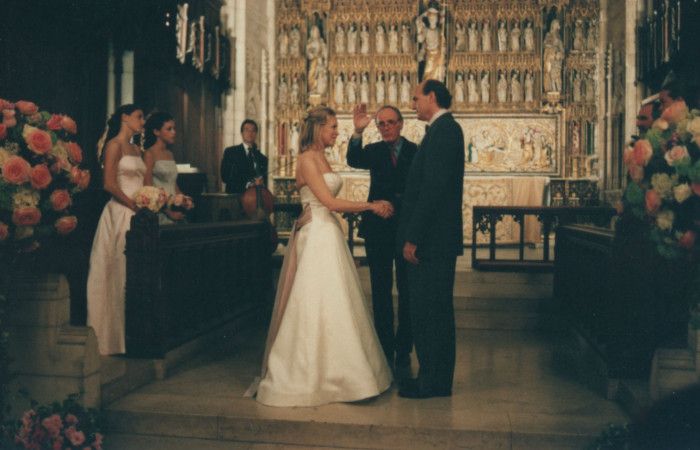 Kim and James taking their vows with James Carroll officiating.  If you look closely, pal Yo-Yo Ma who performed during the ceremony, is standing by the altar