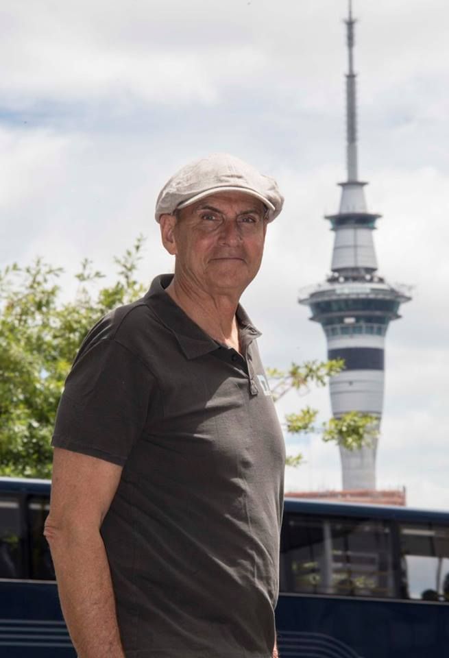 James in front of Auckland’s famous Sky Tower