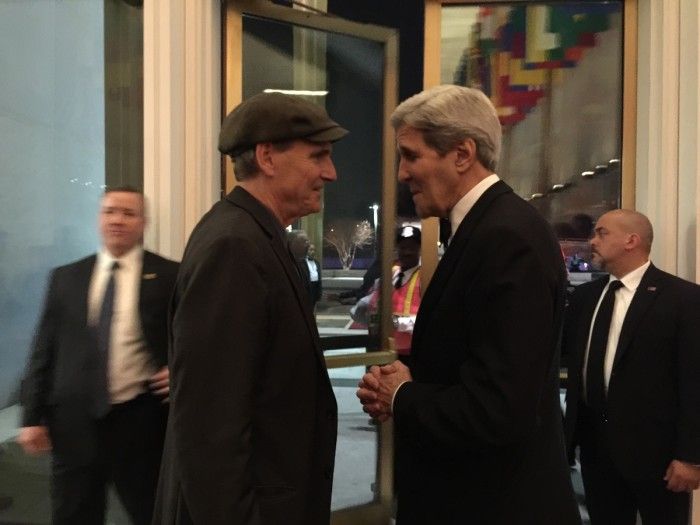 James and John Kerry share a word. (Photo by Ellyn Kusmin).