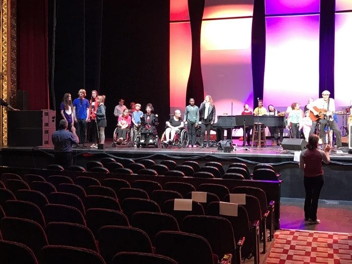 Rehearsing with the children’s chorus of the St. Louis Variety program, with Kate Markowitz and Kim Taylor. Photo by Ellyn Kusmin.