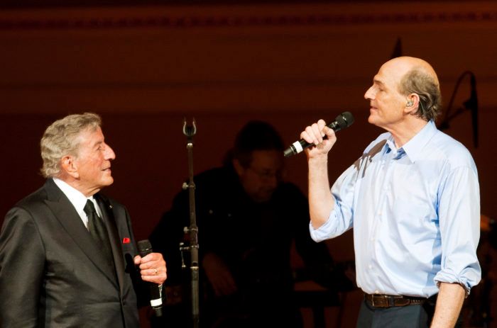 Famed Folk-Rock singer-songwriter JAMES TAYLOR performing with his surprise guest star legendary singer TONY BENNETT at his "James Taylor: Roots" concert in the Carnegie Hall "James Taylor's Perspectives" series  at Carnegie Hall, New York City, Wednesday, 20 April 2011. CREDIT: Photograph © 2011 Jack Vartoogian/FrontRowPhotos. ALL RIGHTS RESERVED.