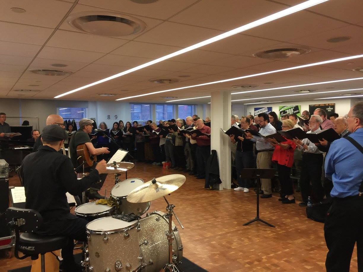 The Oratorio Society of New York rehearsing “Shower the People.” Sean Pelton on drums, Zev Katz on electric bass and Andy Ezrin on piano.  (Photo: Ellyn Kusmin)