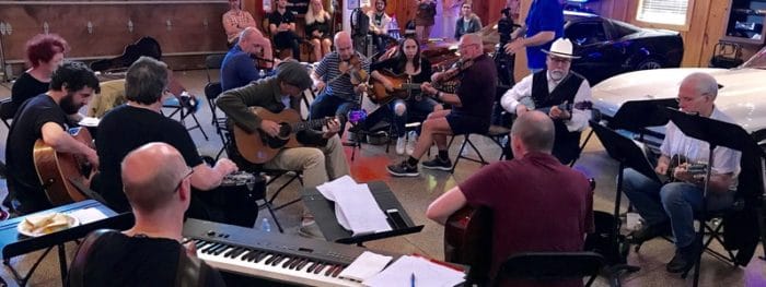 James rehearsing with Jerry Douglas and the Transatlantic Sessions Tour musicians. (Photo by John Crumpler)