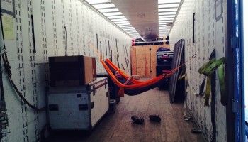 Jon Prince “guarding” one of the trucks. (Photo: Jimmy Johnson)