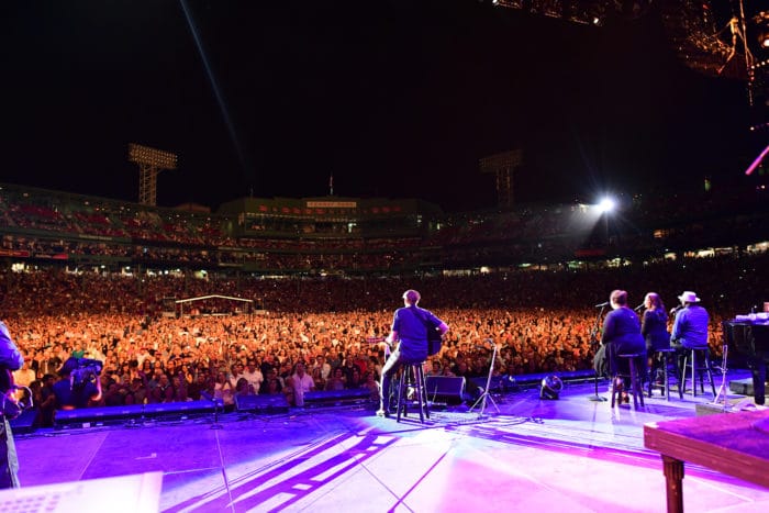 BOSTON, MA – AUGUST 11: James Taylor and Bonnie Raitt at Fenway Park on August 11, 2017 in Boston, Massachusetts. (Photo by Michael Ivins for James Taylor)