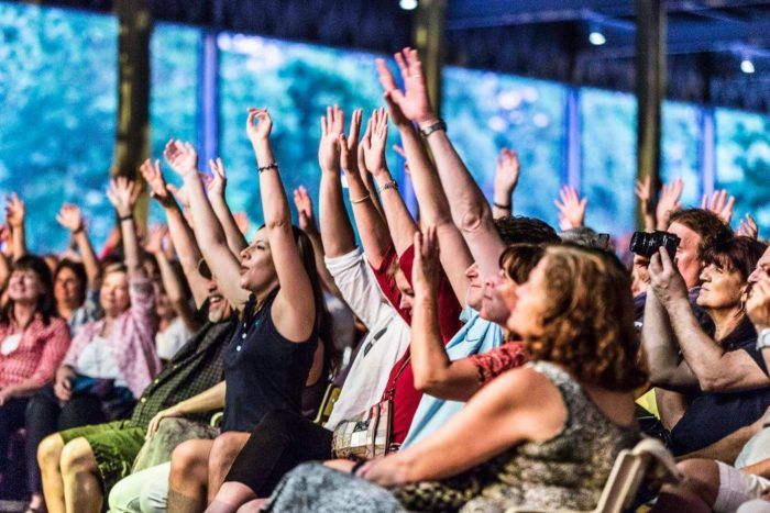 “If you can feel it put your hands on up…” (Photo: Michael Lutch)