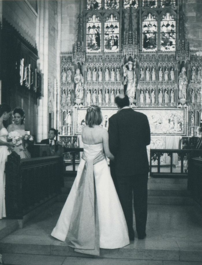 Kim and James enter the church