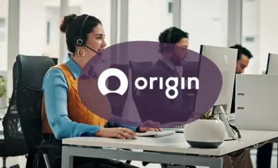 A smiling call center agent wearing a headset at a desk, with the Origin logo overlaid on the image.