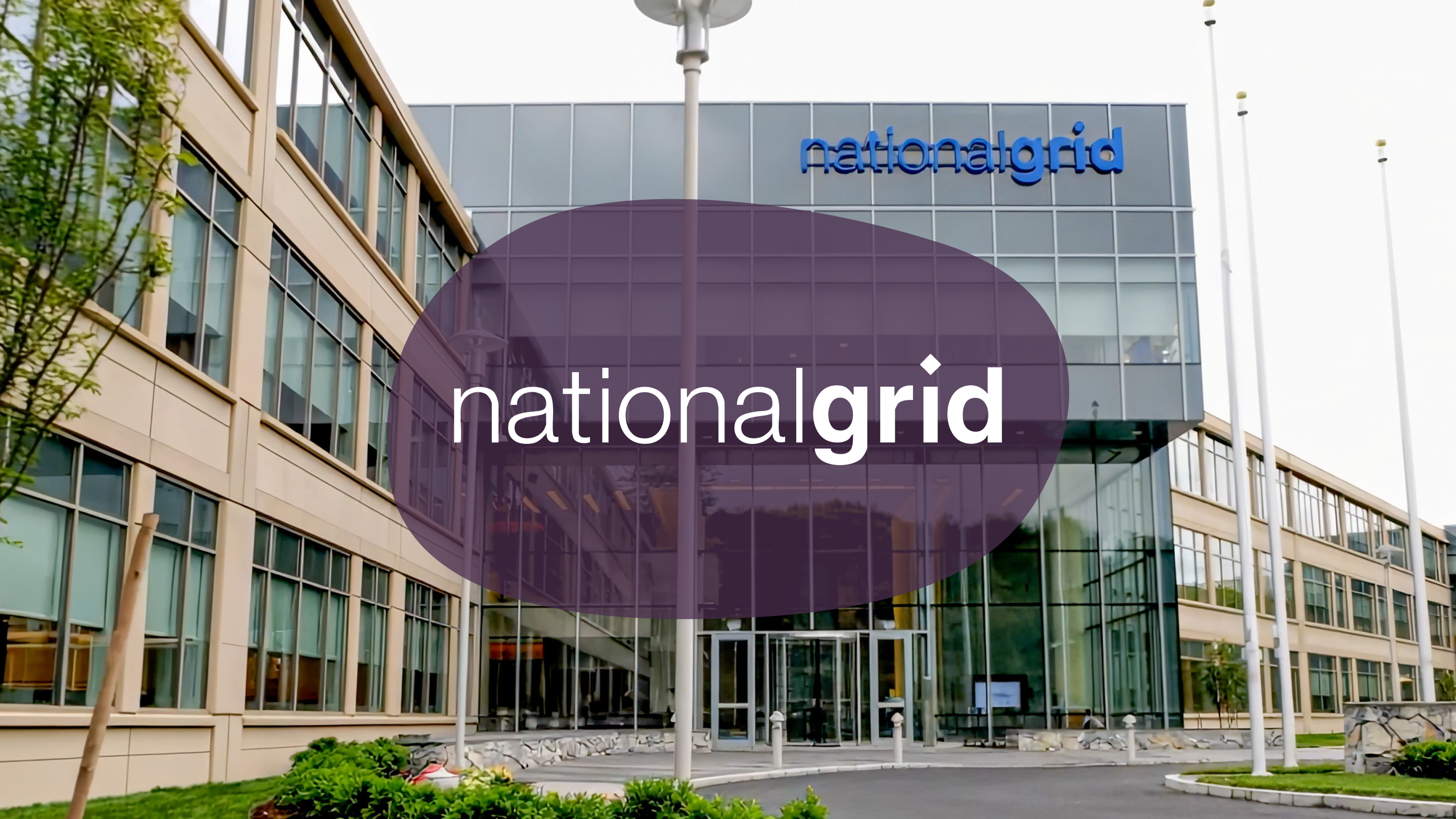 Exterior of the National Grid building with a modern glass and beige facade.