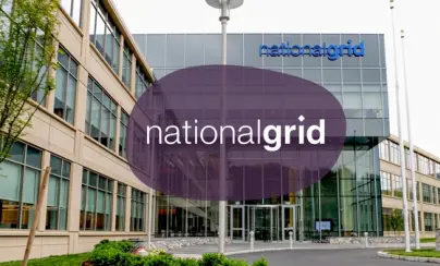 Exterior of the National Grid building with a modern glass and beige facade.