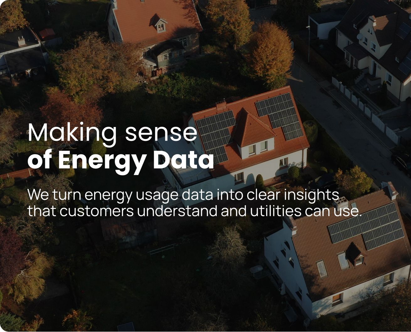 Text overlay: "Making sense of Energy Data," on an aerial view of residential houses, one with prominent solar panels.