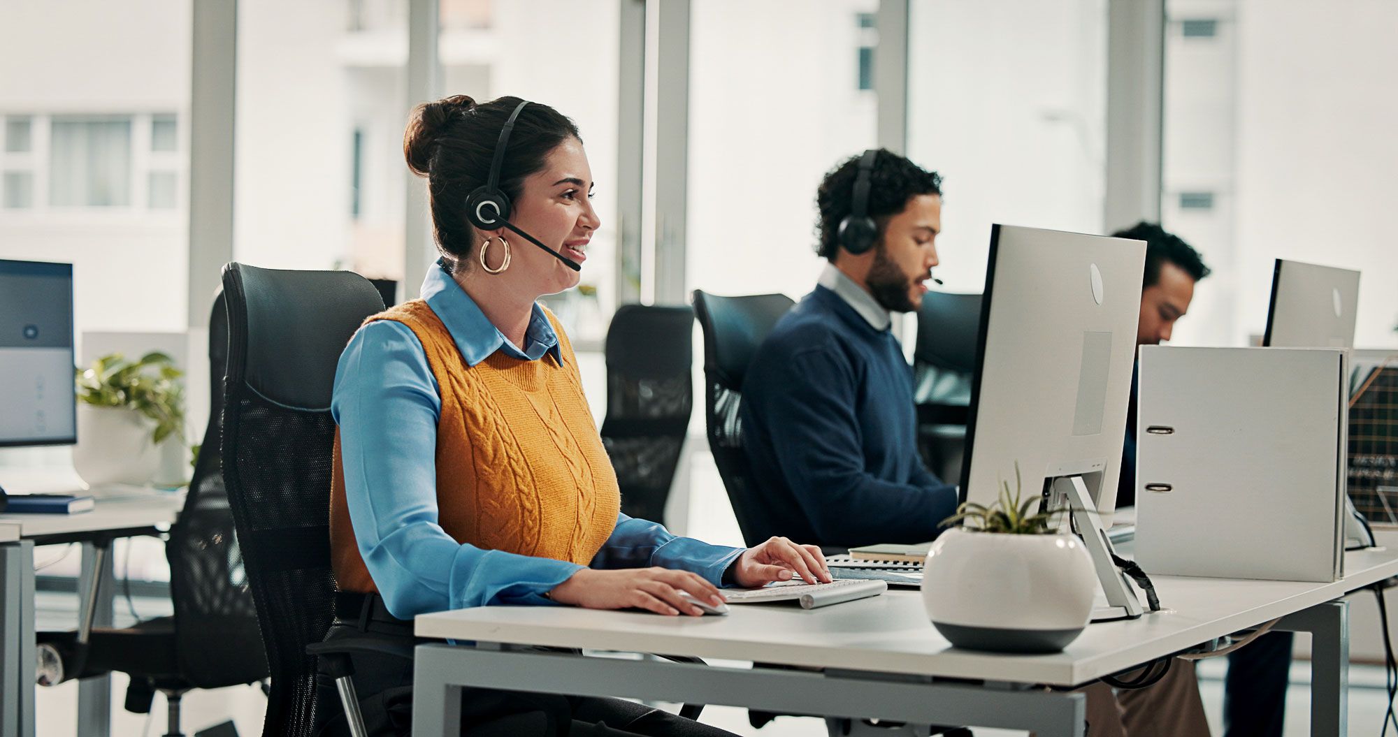 customer service agent in orange jumper